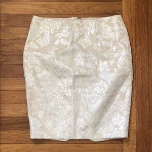 White skirt with metallic detailing